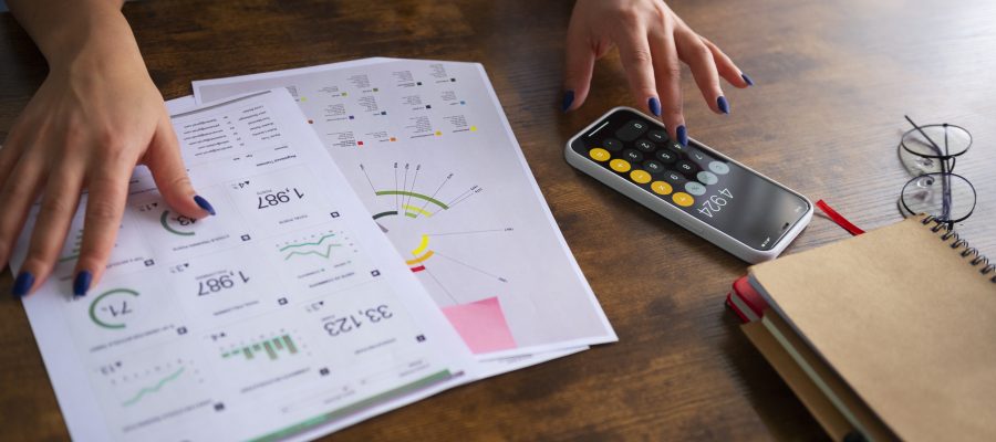 high-angle-woman-working-as-economist